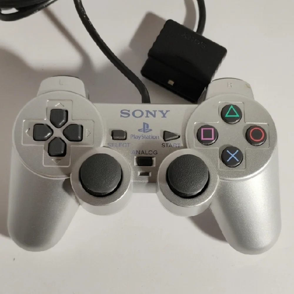 Sony PlayStation Gray Controller with Iconic Design and Analog Sticks SCPH-10010